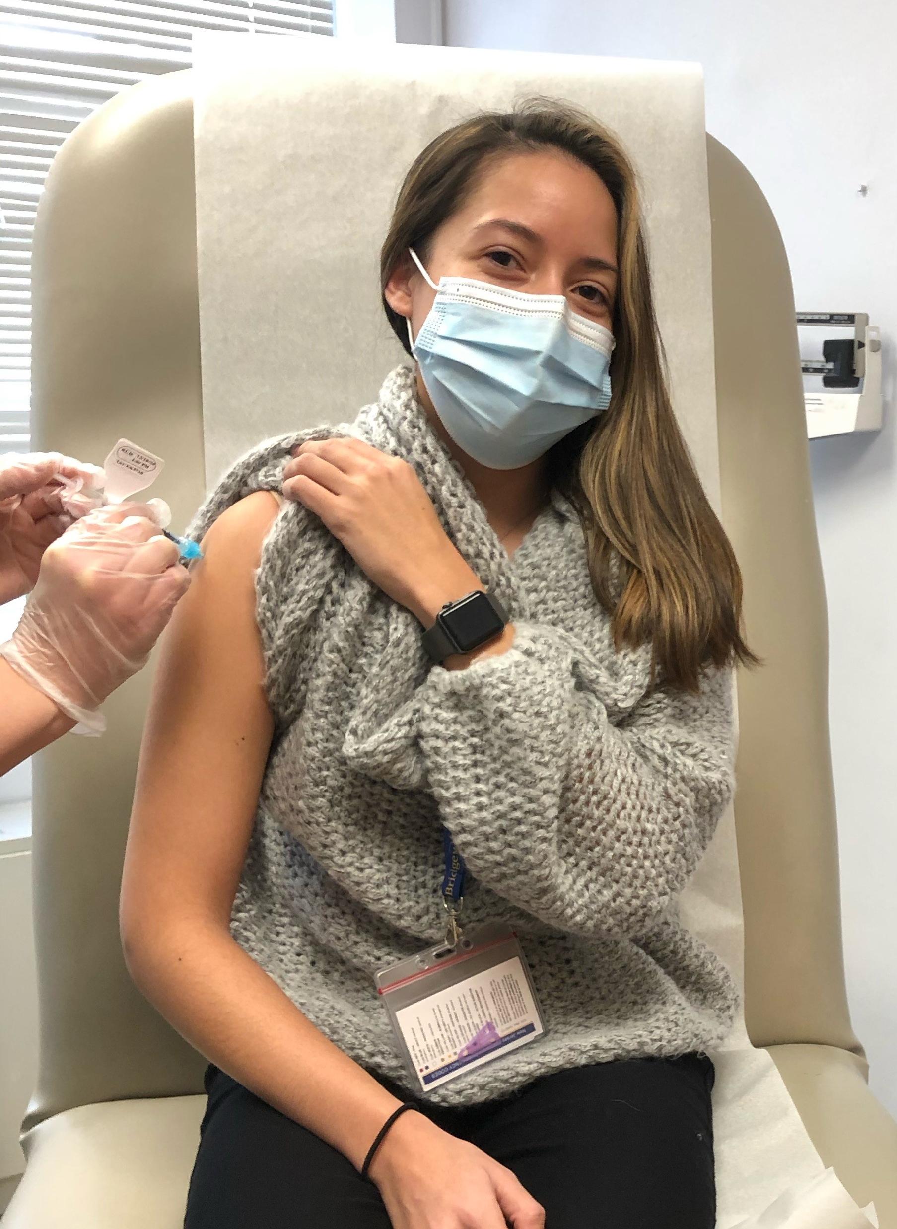 Athletic trainer receives vaccine